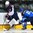GRAND FORKS, NORTH DAKOTA - APRIL 23: USA's James Greenway #14 and Finland's Janne Kuokkanen #18 battle for the puck during semifinal round action at the 2016 IIHF Ice Hockey U18 World Championship. (Photo by Matt Zambonin/HHOF-IIHF Images)

